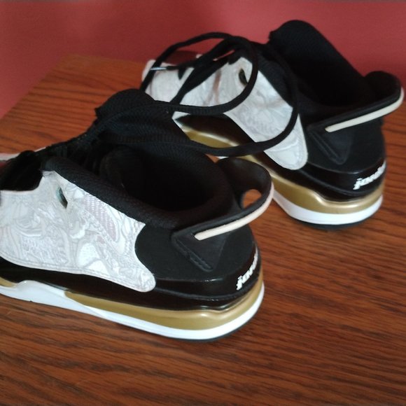 Michael Jordan DOB gold trim sneakers.These are brand new!